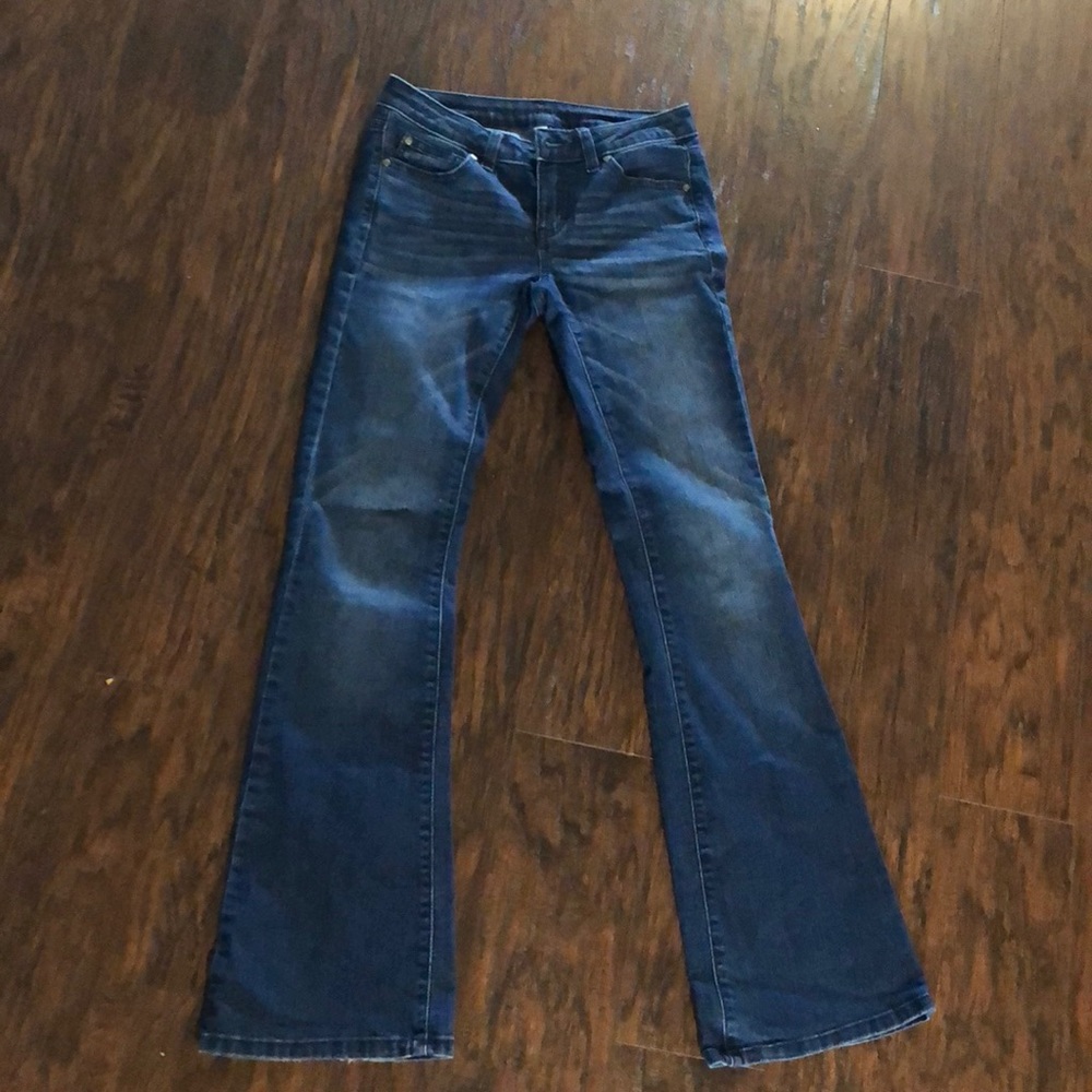 Jennifer Lopez brand new boot leg jeans